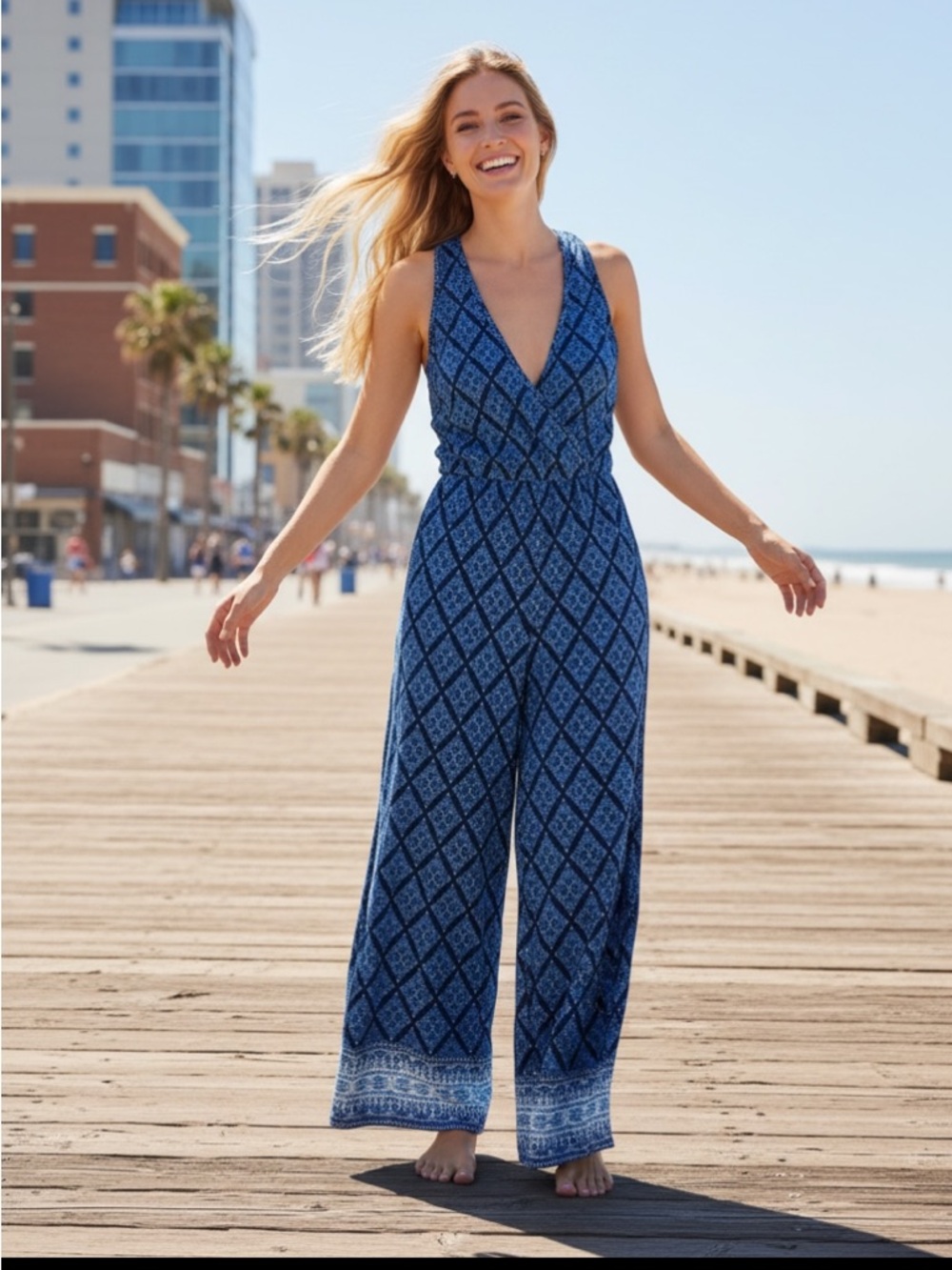 Vacation wear, beachy, coastal, casual and cool one piece jumpsuit.  NWOT